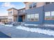 Contemporary townhomes with attractive facades and landscaped front yard at 16777 W 94Th Way, Arvada, CO 80007