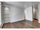 Spacious bedroom with beautiful hardwood floors and built in shelves for ample storage at 3131 E Alameda Ave # 1302, Denver, CO 80209