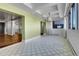 View of living room with patterned floors and cityscape at 3131 E Alameda Ave # 1302, Denver, CO 80209