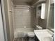 Bathroom featuring tub, shower head, vanity with a mirror, and toilet at 8645 Clay St # 400, Westminster, CO 80031