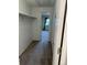Carpeted walk-in closet leading to bedroom in background at 8645 Clay St # 400, Westminster, CO 80031