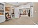 Neutral color palette living room that includes lots of light and a view to the outdoors at 4241 S Meadow Brook Ln, Evergreen, CO 80439