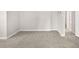 Finished basement with neutral carpet and trim offers versatile space and clean lines at 1856 S Monroe St, Denver, CO 80210