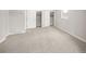 Open floor plan featuring neutral carpet and storage, offering plenty of room at 1856 S Monroe St, Denver, CO 80210