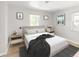 Cozy bedroom featuring comfortable furnishings and warm accents at 1856 S Monroe St, Denver, CO 80210