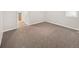 The bright bedroom offers neutral walls, carpet flooring, and a window for natural light at 1856 S Monroe St, Denver, CO 80210