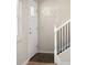 Entryway featuring tiled flooring and white door at 1856 S Monroe St, Denver, CO 80210