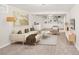 A furnished living room offers stylish decor, neutral colors, and built-in shelves at 1856 S Monroe St, Denver, CO 80210