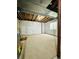 Unfinished basement with exposed ceiling and insulation provides a large flexible space at 6102 S Yampa St, Aurora, CO 80016