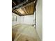 Unfinished basement with exposed beams and partial insulation shows potential for customization at 6102 S Yampa St, Aurora, CO 80016