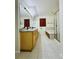 Bathroom featuring a double vanity, bathtub, and walk-in shower at 6102 S Yampa St, Aurora, CO 80016