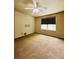 Bedroom with carpeting, ceiling fan, and ample sunlight at 6102 S Yampa St, Aurora, CO 80016