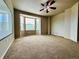 Spacious bedroom with a bay window and ceiling fan at 6102 S Yampa St, Aurora, CO 80016