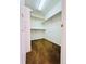 Walk in closet with carpeting and shelving at 6102 S Yampa St, Aurora, CO 80016