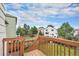 Backyard with lawn area seen from the wooden deck at 4710 N Foxtail Dr, Castle Rock, CO 80109