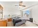 Bedroom with a large window providing natural light, and brass furniture at 4710 N Foxtail Dr, Castle Rock, CO 80109