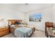 Bedroom with a large window bringing in natural light and carpeted flooring at 4710 N Foxtail Dr, Castle Rock, CO 80109