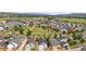 Picturesque aerial view of a neighborhood with homes, streets, and green spaces at 3678 Shadow Cir, Castle Rock, CO 80109