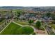 Beautiful aerial view of a community with green spaces and well-maintained homes, showcasing the neighborhood's layout at 3678 Shadow Cir, Castle Rock, CO 80109