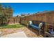 Private backyard space with a wooden fence, comfortable seating, and drought-resistant landscaping at 3678 Shadow Cir, Castle Rock, CO 80109