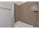 Cozy bathroom features a bathtub with shower, and a decorative shower curtain at 3678 Shadow Cir, Castle Rock, CO 80109