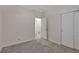 Bedroom showcasing neutral walls, carpet, closet, and easy access to the en suite bathroom at 3678 Shadow Cir, Castle Rock, CO 80109