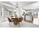 Inviting dining area next to the kitchen with stylish chandelier and natural light at 3678 Shadow Cir, Castle Rock, CO 80109