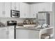 Well-appointed kitchen features granite countertops and stainless steel appliances at 3678 Shadow Cir, Castle Rock, CO 80109