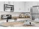 Well-equipped kitchen with stainless steel appliances and granite countertops at 3678 Shadow Cir, Castle Rock, CO 80109