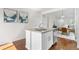 Stylish kitchen island with granite countertop, double sink, and ample storage space at 3678 Shadow Cir, Castle Rock, CO 80109