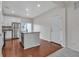Modern kitchen with stainless steel appliances, white cabinets, and a center island at 3678 Shadow Cir, Castle Rock, CO 80109