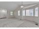 Bright and airy living room with vaulted ceilings and neutral carpet at 3678 Shadow Cir, Castle Rock, CO 80109