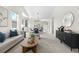Bright, open-concept living area with modern decor and plenty of natural light at 3678 Shadow Cir, Castle Rock, CO 80109