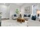 Cozy living room with plush seating, modern decor, and ample natural light at 3678 Shadow Cir, Castle Rock, CO 80109