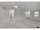 Open living space with high ceilings and neutral carpet at 3678 Shadow Cir, Castle Rock, CO 80109