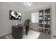 Well-lit office space with a desk, shelving, decor, and a window for natural light at 3678 Shadow Cir, Castle Rock, CO 80109