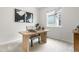Bright office with a modern desk, neutral decor, and natural light at 3678 Shadow Cir, Castle Rock, CO 80109