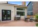 Relaxing deck area featuring a grill and cozy seating, great for outdoor dining and entertaining at 23 Honey Locust, Littleton, CO 80127