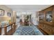 Open concept dining room that flows into a modern kitchen with lots of natural light at 23 Honey Locust, Littleton, CO 80127
