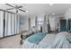 Spacious open bedroom concept with carpet floors and partition curtains to divide space at 23593 E Chenango Pl, Aurora, CO 80016