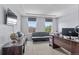 Comfortable home office with a futon and great natural light at 23593 E Chenango Pl, Aurora, CO 80016