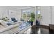 Elegant living room with stylish furniture, large windows, and a cozy atmosphere at 23593 E Chenango Pl, Aurora, CO 80016