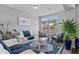 Comfortable living room features modern furniture and natural light, perfect for relaxing at 23593 E Chenango Pl, Aurora, CO 80016