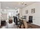 Open concept floor plan shows dining room leading into living room with lovely stone fireplace at 1390 S Idalia St # 39F, Aurora, CO 80017