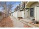 Inviting townhouse featuring a secure gated front porch, creating a private entrance and cozy curb appeal at 1390 S Idalia St # 39F, Aurora, CO 80017