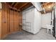 Unfinished basement area with exposed ceiling and stud walls, offering potential for customization at 3465 Beeler Ct, Denver, CO 80238