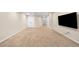 Spacious finished basement with neutral carpet, large open area and access to utility areas at 3465 Beeler Ct, Denver, CO 80238