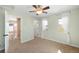 Bedroom with big windows and breezy white curtains at 3465 Beeler Ct, Denver, CO 80238
