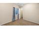 Bedroom featuring neutral paint, a window, and a closet for storage at 3465 Beeler Ct, Denver, CO 80238