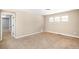 Bedroom featuring a door and three bright windows at 3465 Beeler Ct, Denver, CO 80238